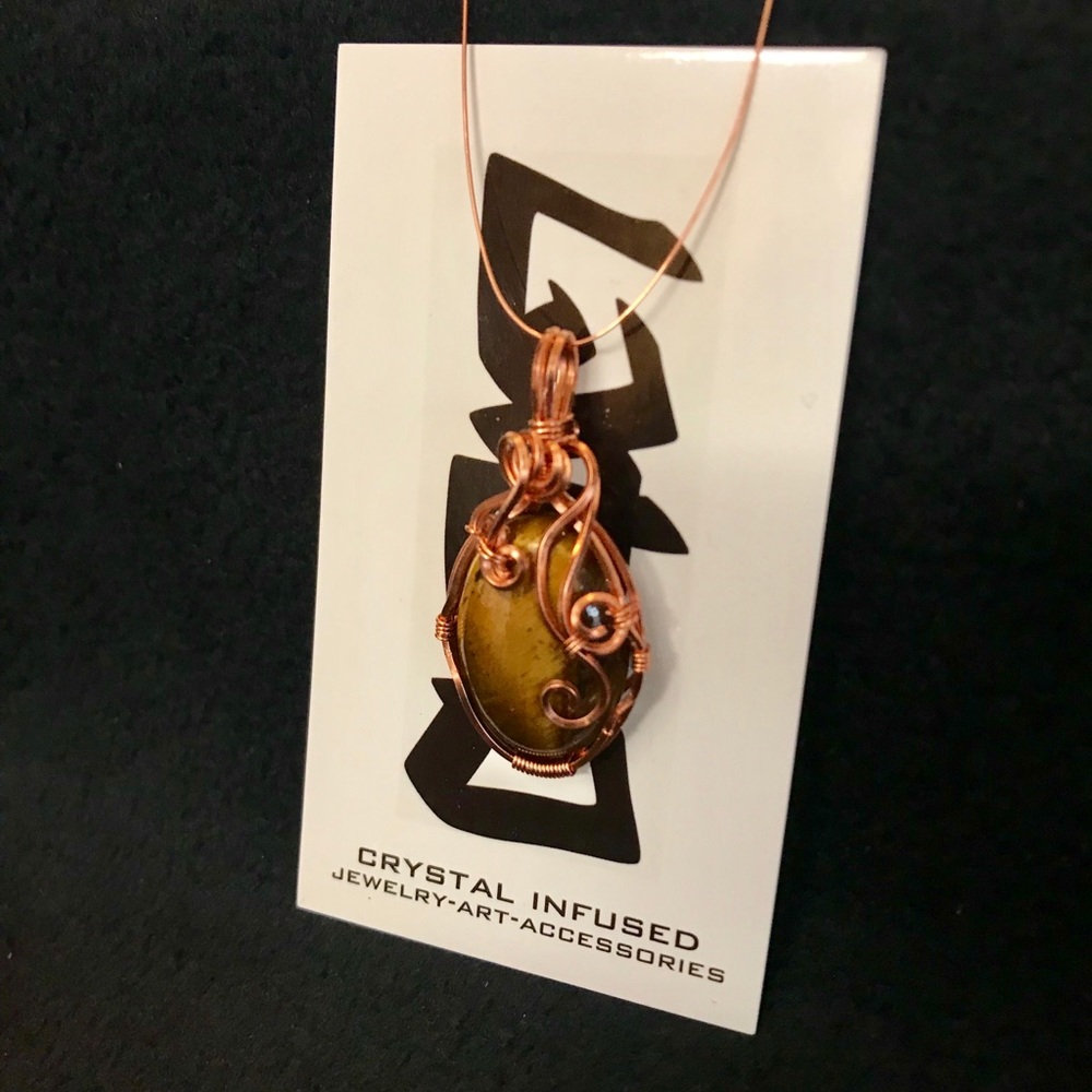 Mini Tiger Eye cabachon wrapped in copper